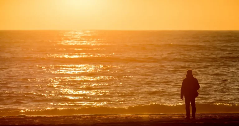 person thinking sunset