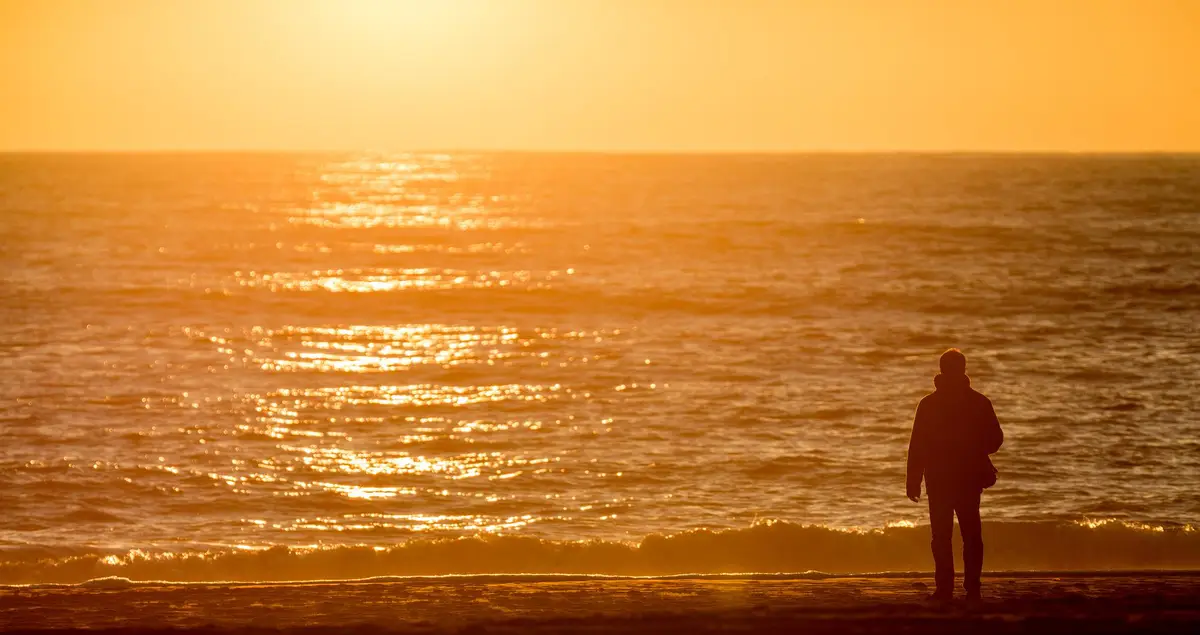 person thinking sunset